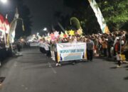 Masyarakat Antusias, Pawai Lampion Taptu HUT RI ke-81 Meriahkan Malam Kemerdekaan di Depan Pendopo Kuningan